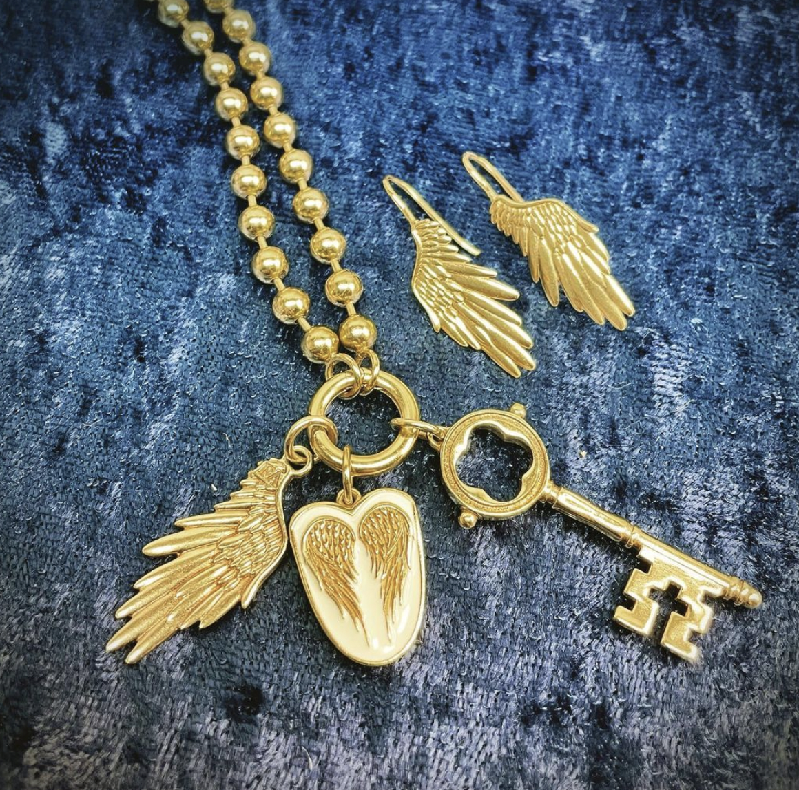 14K Yellow Gold Winged Key Necklace